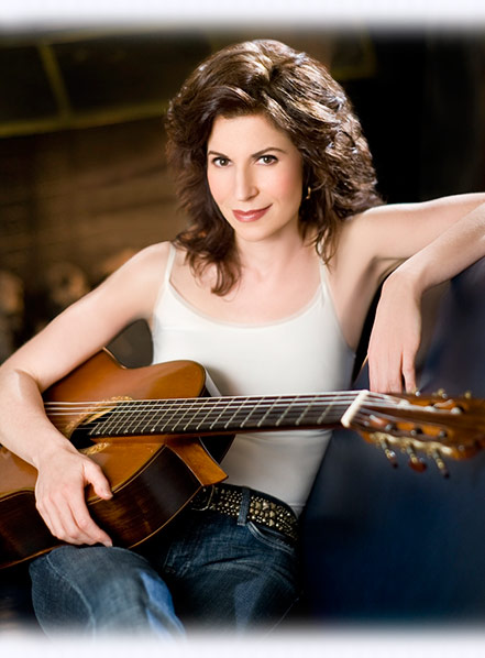 Sharon Isbin Sitting with Guitar